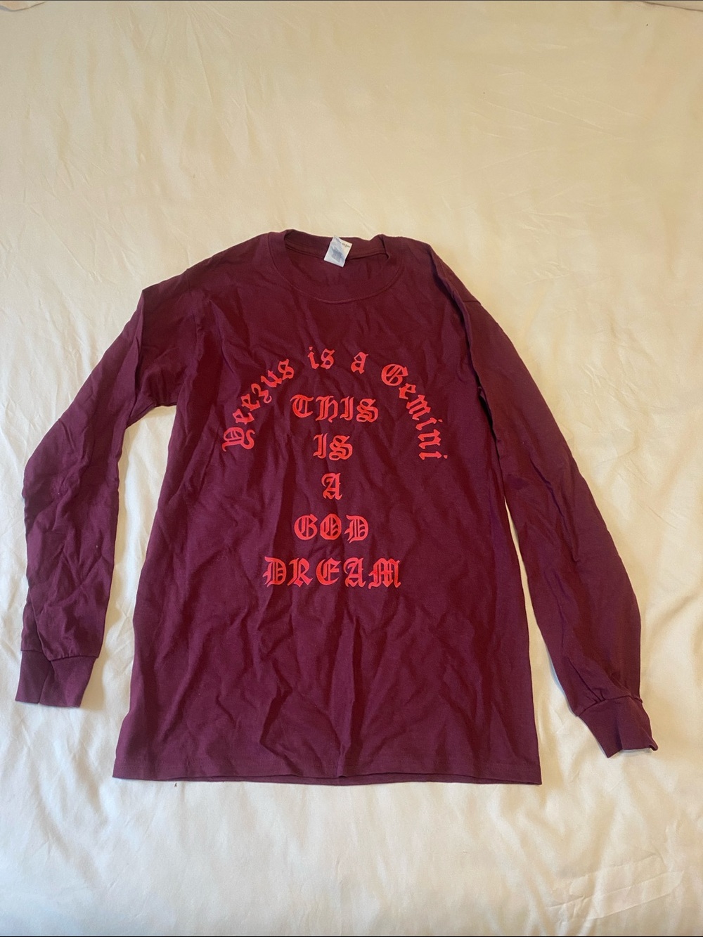 Maroon Kanye West Graphic Long Sleeve Tee with Red Gothic Text.